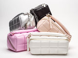 Makeup Bags Estetika leaning on each other in Pink, Black, Silver, White & Blush Pink